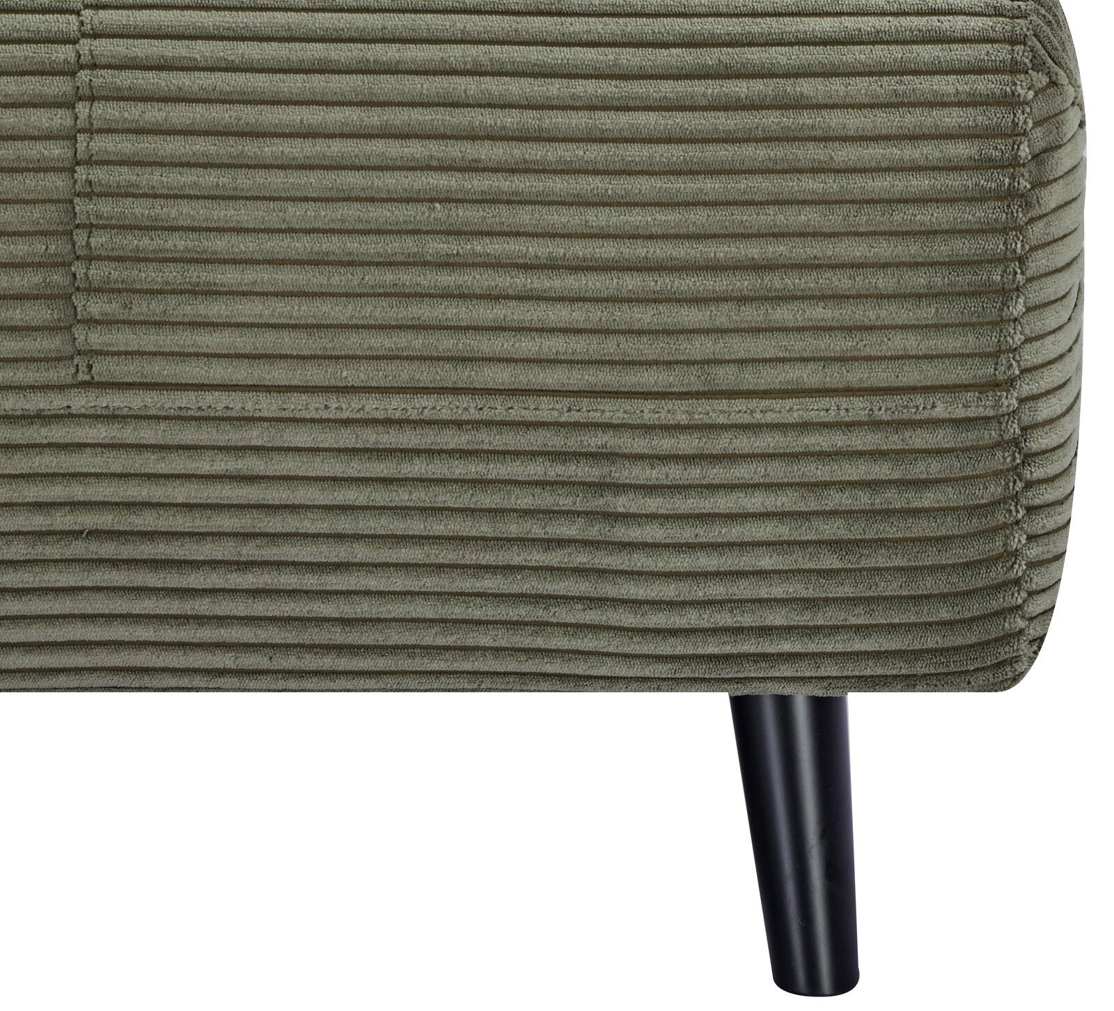Nahaufnahme eines grünen Funktionssessels mit geripptem Stoffbezug und schwarzem Bein, seitliche Perspektive.