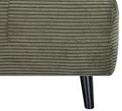 Close-up van een groene functionele fauteuil met geribbelde stoffen bekleding en zwarte poten, gezien vanaf de zijkant.