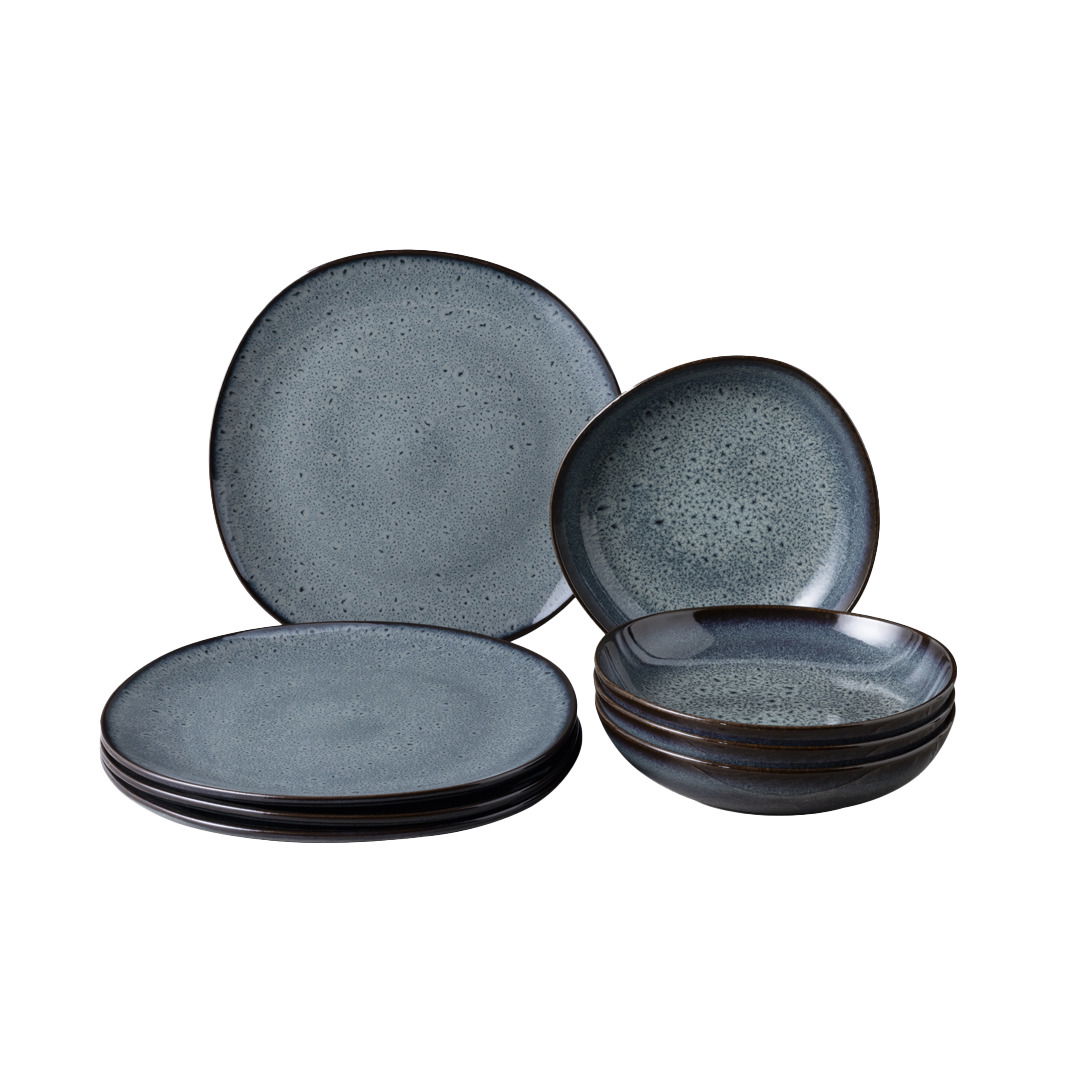 Tafelservice 8-tlg. in dunklem Blau mit gesprenkeltem Design, bestehend aus flachen und tiefen Tellern, seitliche Perspektive