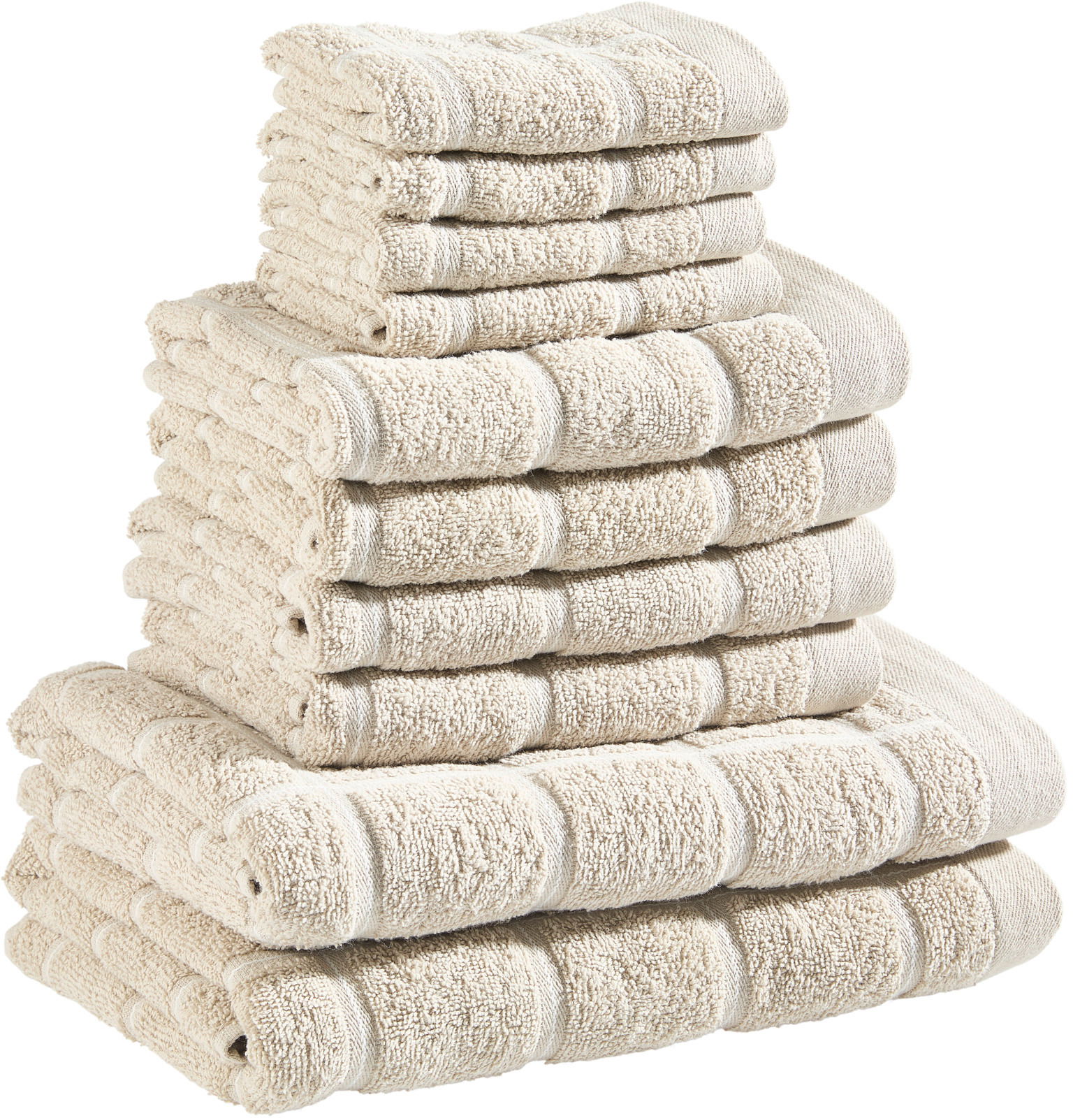 Ein Stapel beiger Frottierhandtücher in verschiedenen Größen, von der Seite betrachtet.