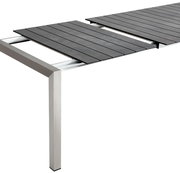 Moderner Ausziehtisch mit dunkler Tischplatte und Metallgestell, seitliche Perspektive