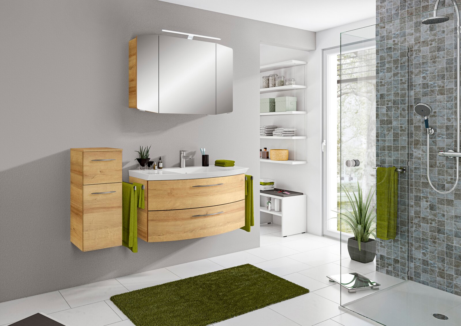 Moderne Badkombination mit Holzoptik, bestehend aus einem Waschtisch mit Schubladen, einem Spiegelschrank und einem hohen Schrank, aus der Perspektive eines hellen Badezimmers mit grünen Akzenten.
