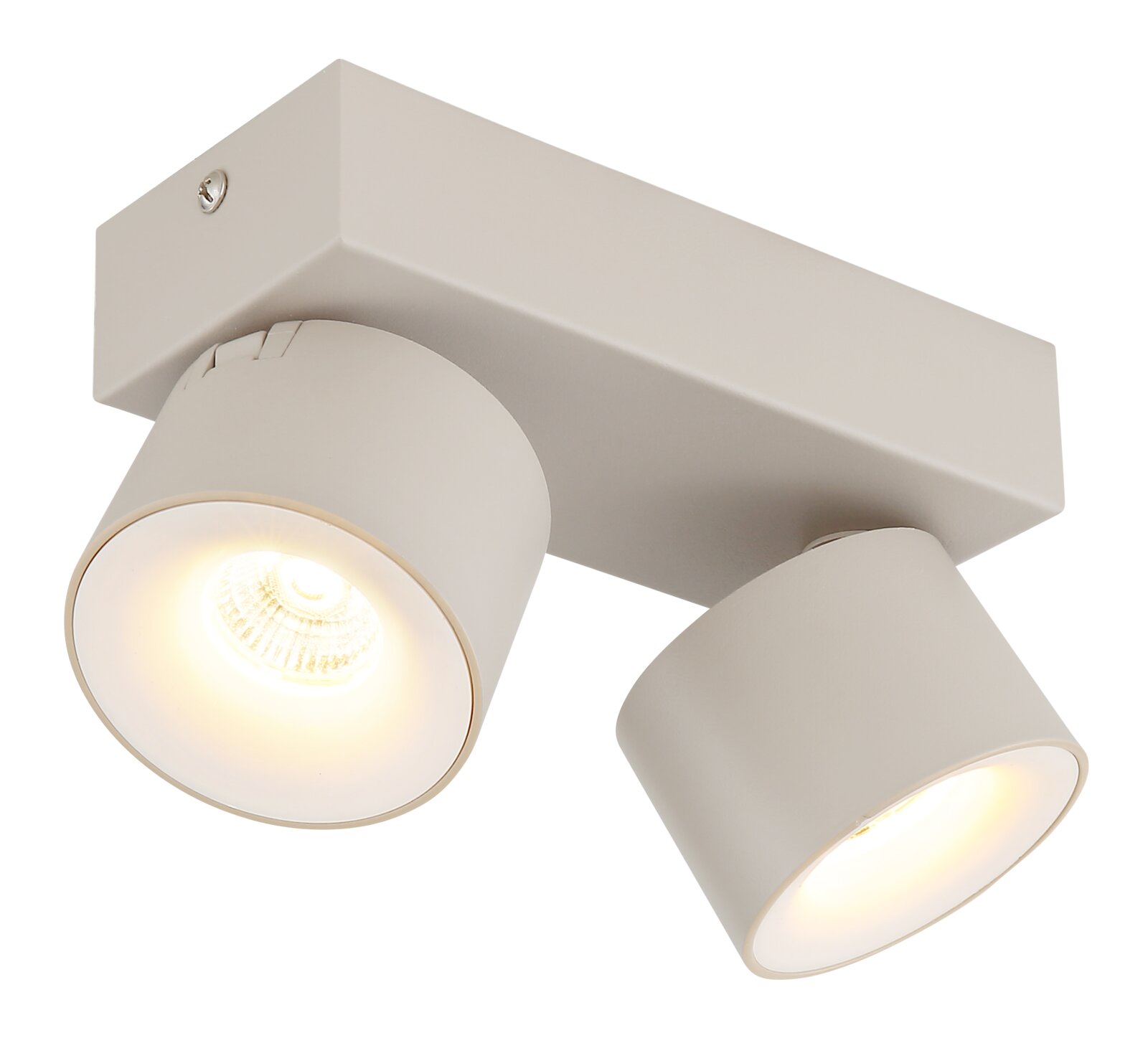 Beiger Deckenstrahler mit zwei schwenkbaren Spotköpfen und warmweiß leuchtenden LED-Lampen, schräg von unten in Nahaufnahme fotografiert