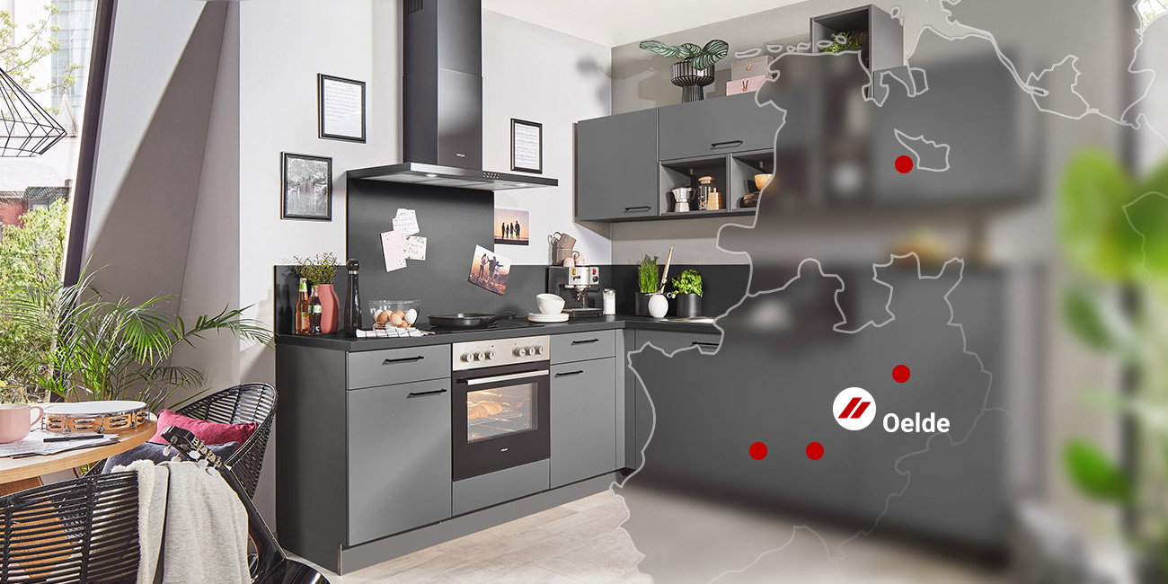 Moderne Küche in Anthrazit mit Deutschlandkarte und markiertem Standort Oelde.