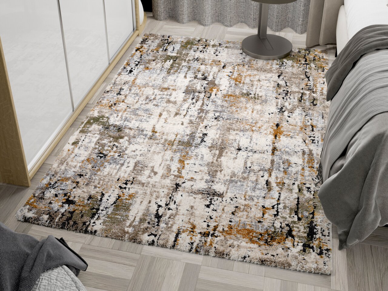 Designer Teppich mit abstraktem Muster in Grau-, Beige- und Orangetönen, auf einem Holzboden neben einem Bett und einem runden Tisch, aus der Vogelperspektive fotografiert.