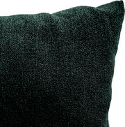Nahaufnahme eines dunkelgrünen Kissens mit weicher Textur, perspektivisch von der Seite aufgenommen.