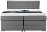 Graues Boxspringbett mit gestepptem Kopfteil, Vorderansicht