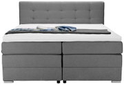 Graues Boxspringbett mit gestepptem Kopfteil, Vorderansicht