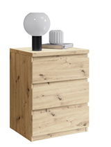 Nachtkommode aus hellem Holz mit drei Schubladen, darauf eine runde Lampe und ein Buch, seitliche Perspektive