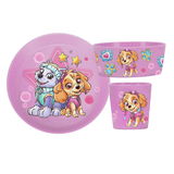 Paw Patrol Kinder-Set, bestehend aus einem Teller, einer Schüssel und einem Becher, mit bunten Paw Patrol-Motiven auf rosa Hintergrund, aus der Frontalperspektive.