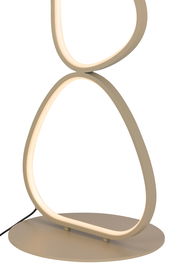 Moderne LED-Stehleuchte mit geschwungenem, ovalem Design in seitlicher Perspektive.