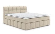 Beiges Boxspringbett mit gestepptem Kopfteil, seitliche Perspektive