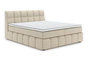 Beiges Boxspringbett mit gestepptem Kopfteil, seitliche Perspektive