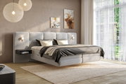 Modernes Boxspringbett in einem stilvollen Schlafzimmer mit großen Fenstern, seitliche Perspektive.