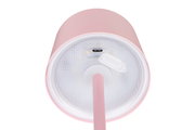 Unteransicht einer rosa Akku-Tischleuchte mit USB-Ladeanschluss.