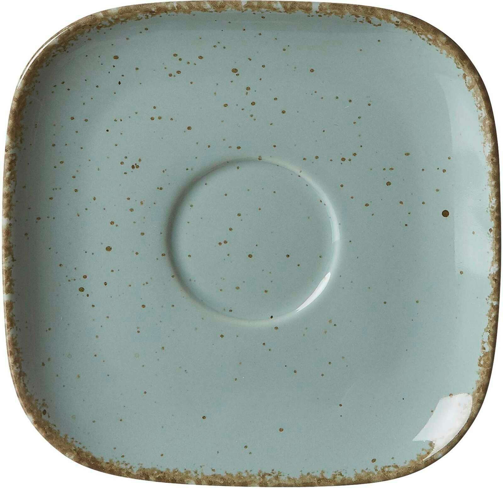 Vogelperspektive auf eine quadratische, blaue Untertasse mit gesprenkeltem Design und rustikalem Rand.