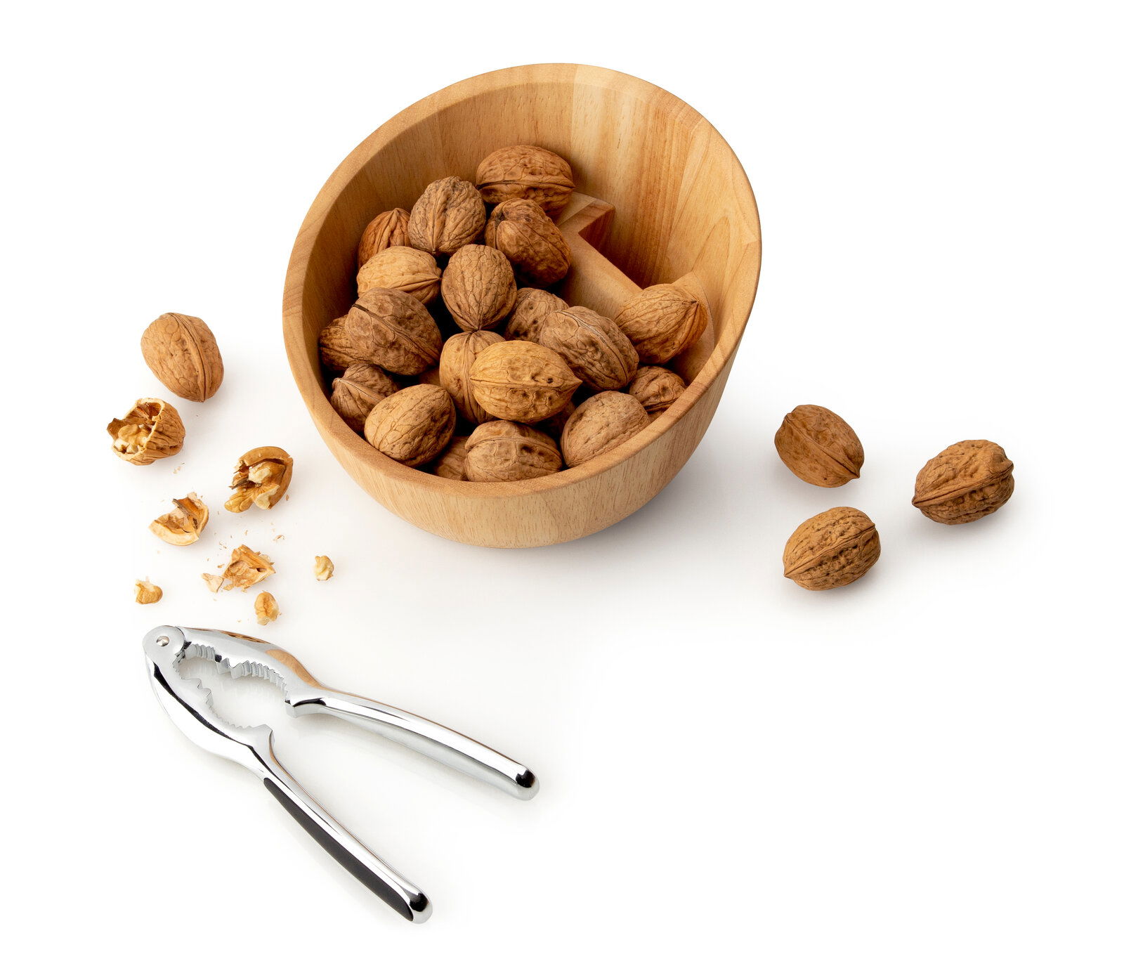 Holzschale mit Walnüssen und Metall-Nussknacker, Ansicht von oben