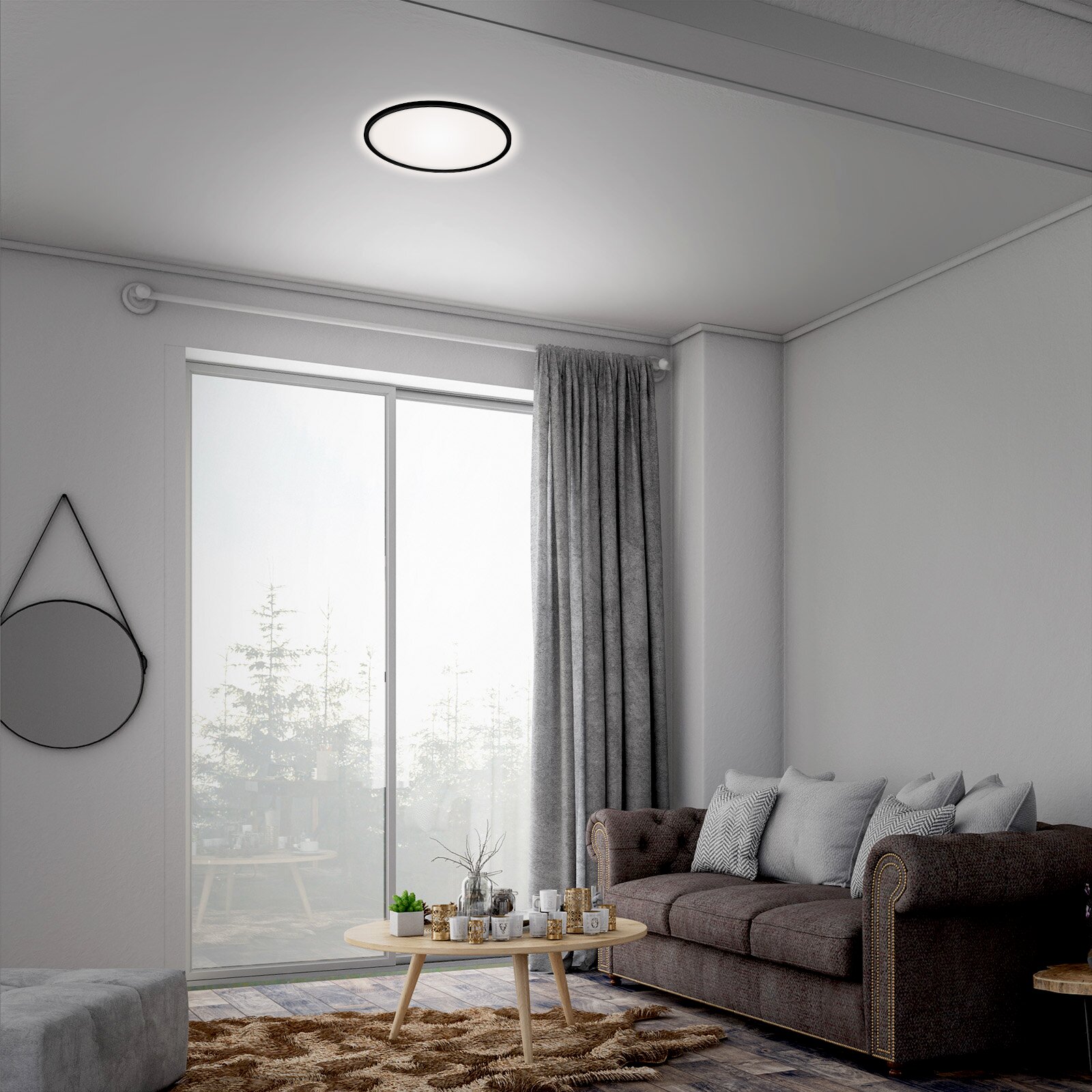 Moderne led-plafondlamp in een stijlvolle woonkamer, van onderaf gezien.