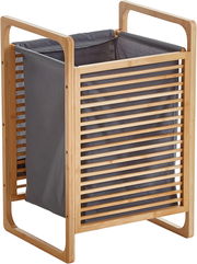 Bambus-Wäschekorb mit grauem Stoffeinsatz und Lamellen-Seiten, freistehend, in schräger Vorderansicht