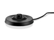 Zwarte ronde elektrische contactvoet met snoer voor een waterkoker, schuin van voren en bovenaf gezien