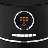 Nahaufnahme der digitalen Anzeige einer schwarzen Heißluftfritteuse mit Temperaturanzeige und verschiedenen Symbolen für Kochmodi.