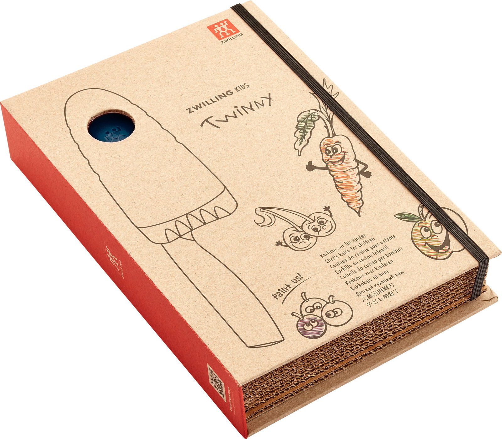 Verpackung eines blauen Kinderkochmessers von Zwilling, mit lustigen Gemüseillustrationen und einem Sichtfenster, schräg von oben fotografiert.