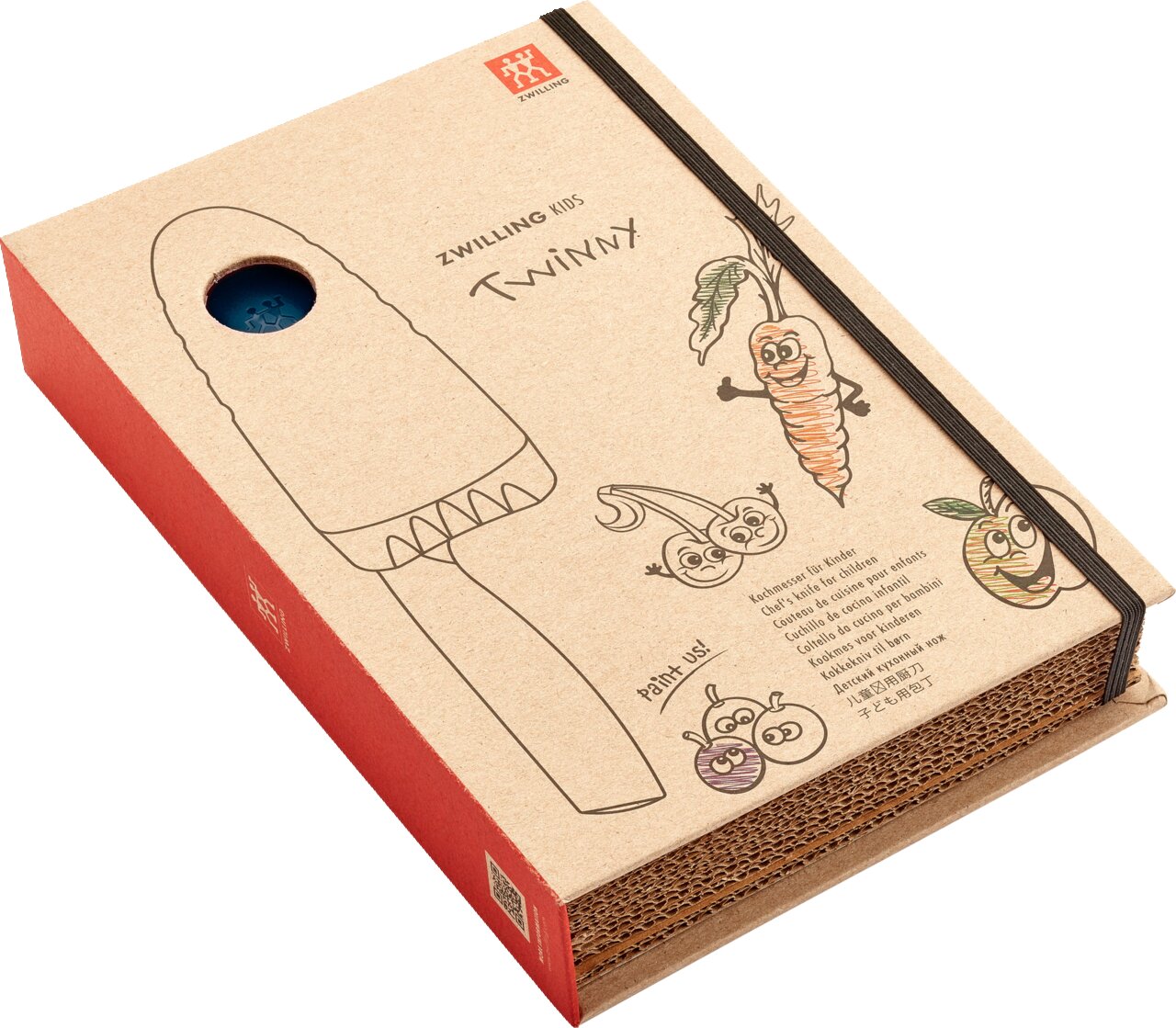 Verpackung eines blauen Kinderkochmessers von Zwilling, mit lustigen Gemüseillustrationen und einem Sichtfenster, schräg von oben fotografiert.