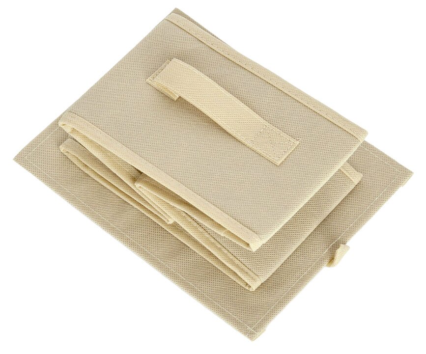 Beige gefaltete Stoffboxen mit Griff, von oben betrachtet.