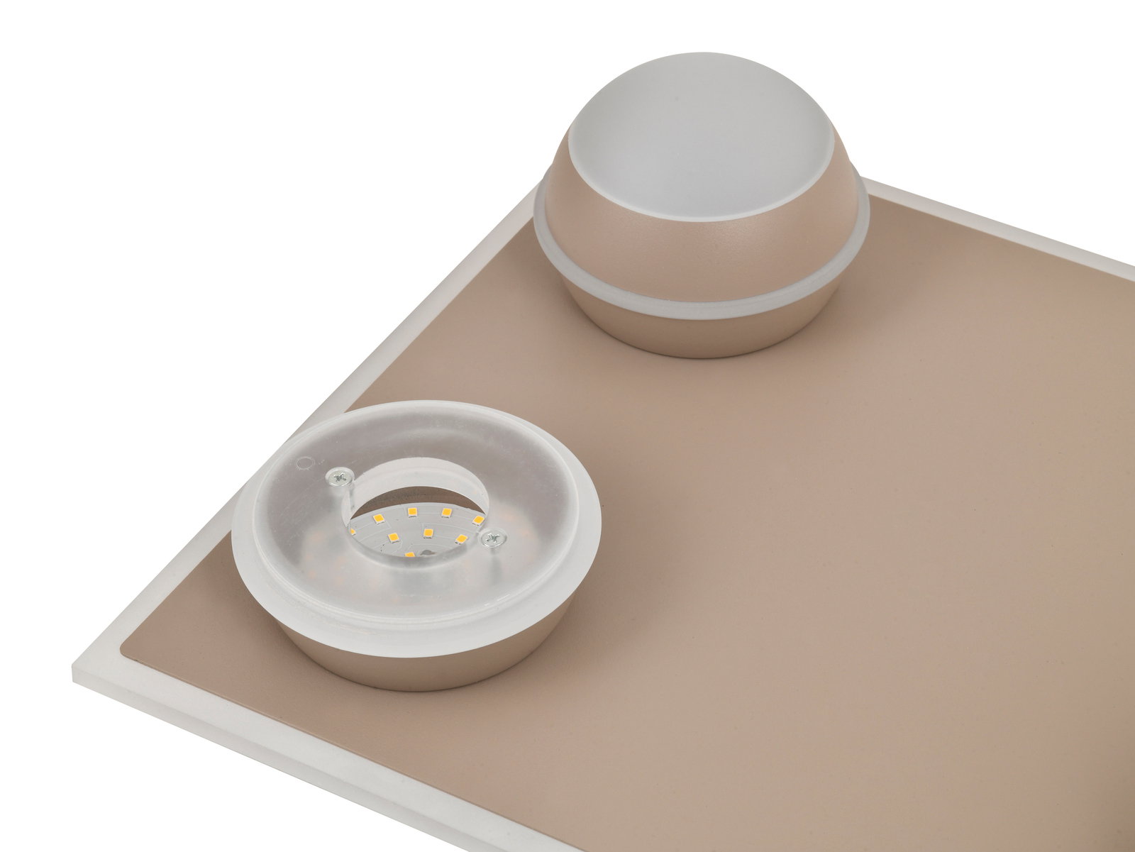 Nahaufnahme einer LED-Deckenleuchte mit zwei runden Leuchtelementen auf einer rechteckigen Platte, seitliche Perspektive