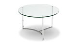 Runder Couchtisch mit Glasplatte und verchromtem Metallgestell, seitliche Perspektive