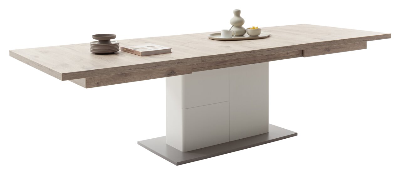 Moderner Esstisch mit Holzoptik und zentralem weißen Sockel, seitliche Perspektive