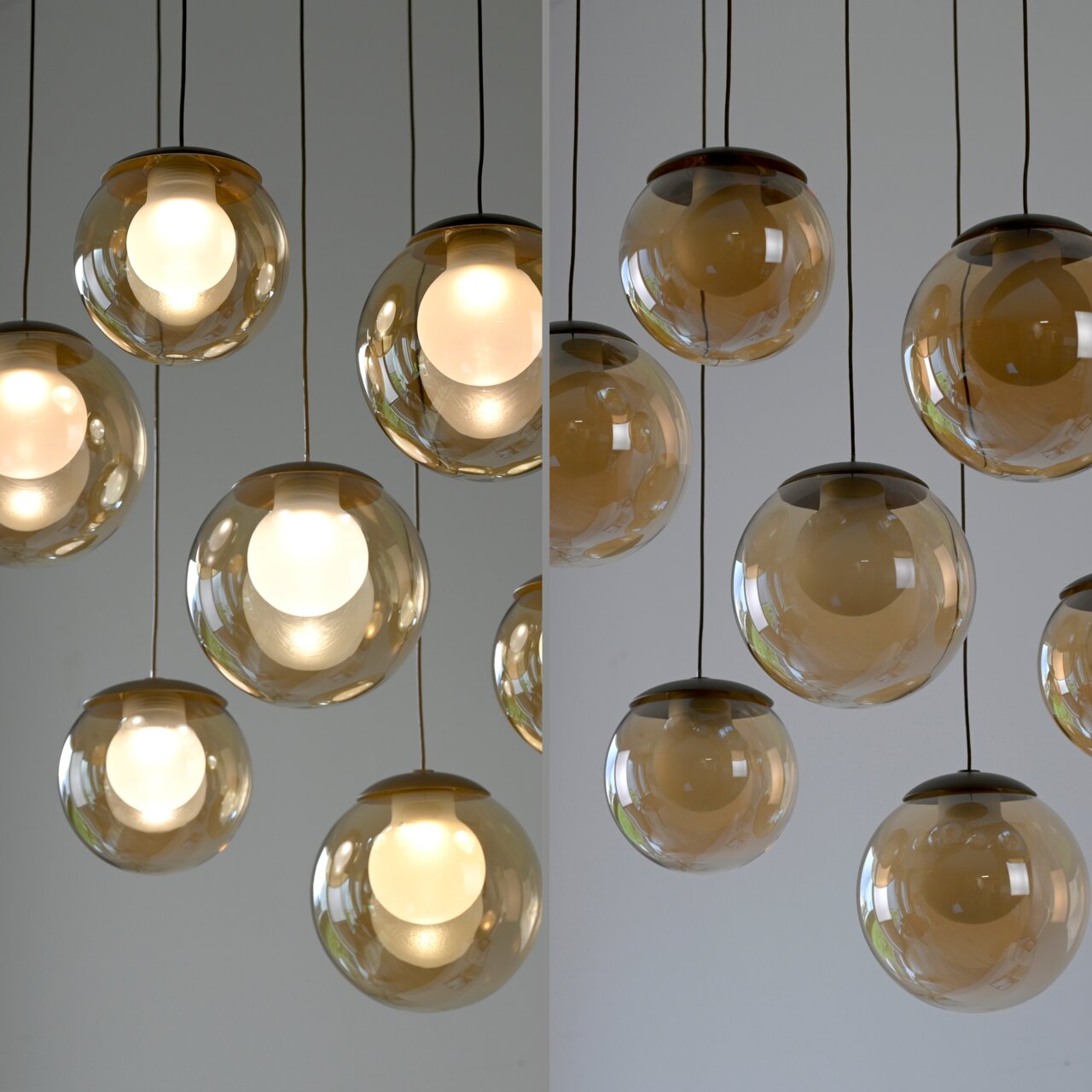 Moderne LED-Pendelleuchte mit mehreren kugelförmigen, transparenten Lampenschirmen, von unten betrachtet.