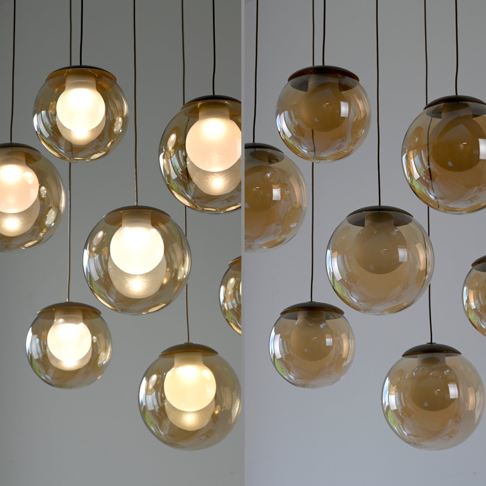 Moderne LED-Pendelleuchte mit mehreren kugelförmigen, transparenten Lampenschirmen, von unten betrachtet.