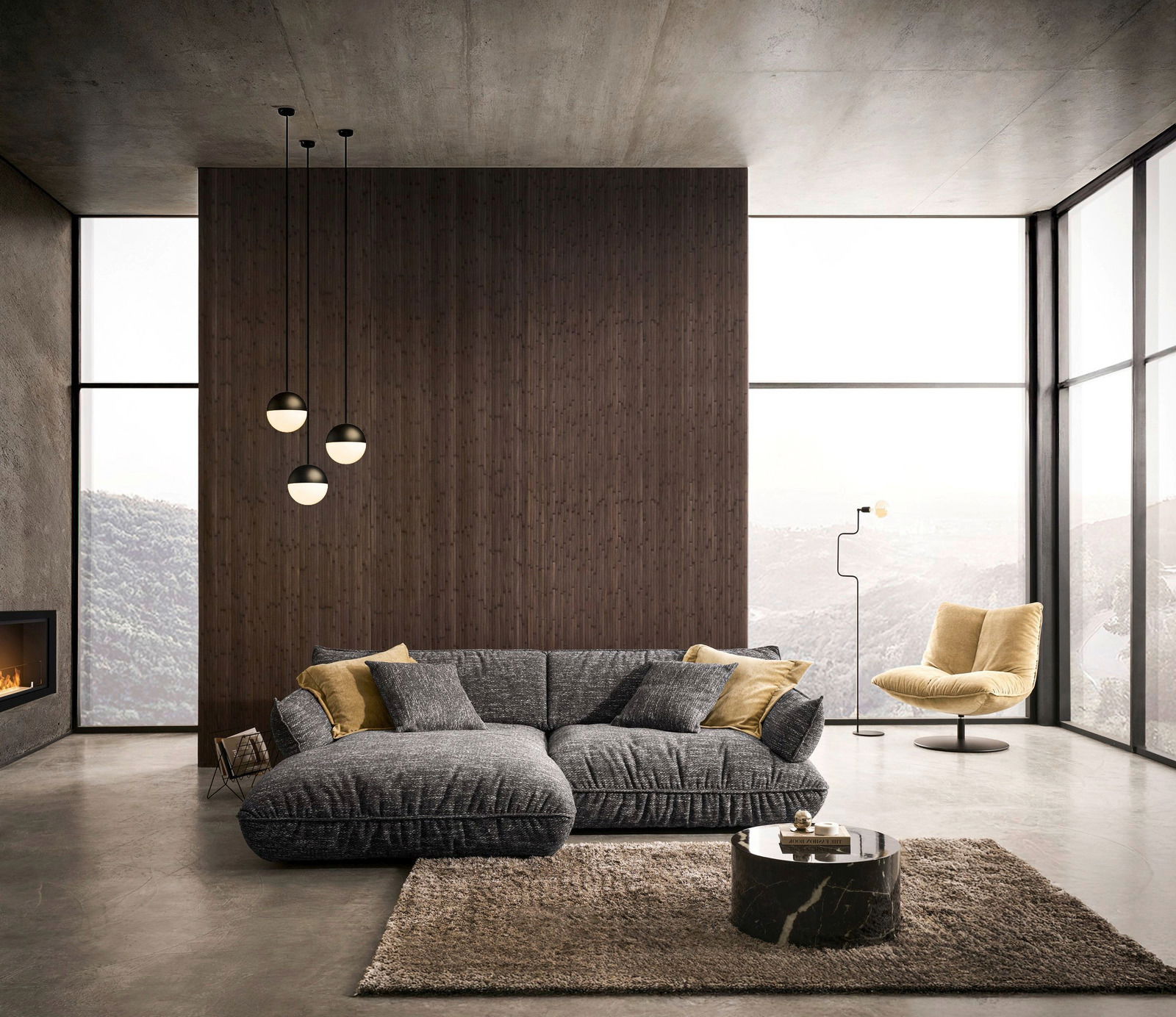 Moderne Longchairkombination in einem stilvollen Wohnzimmer mit großen Fenstern und Bergblick, aus der Frontalperspektive aufgenommen.