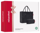 Schwarzes Shopper-Set mit glänzenden Punkten, bestehend aus einer großen Tasche und einem kleineren Etui, seitliche Perspektive.