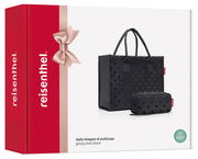 Schwarzes Shopper-Set mit glänzenden Punkten, bestehend aus einer großen Tasche und einem kleineren Etui, seitliche Perspektive.