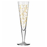 Champagnerglas mit goldenen Herzmustern, seitliche Perspektive