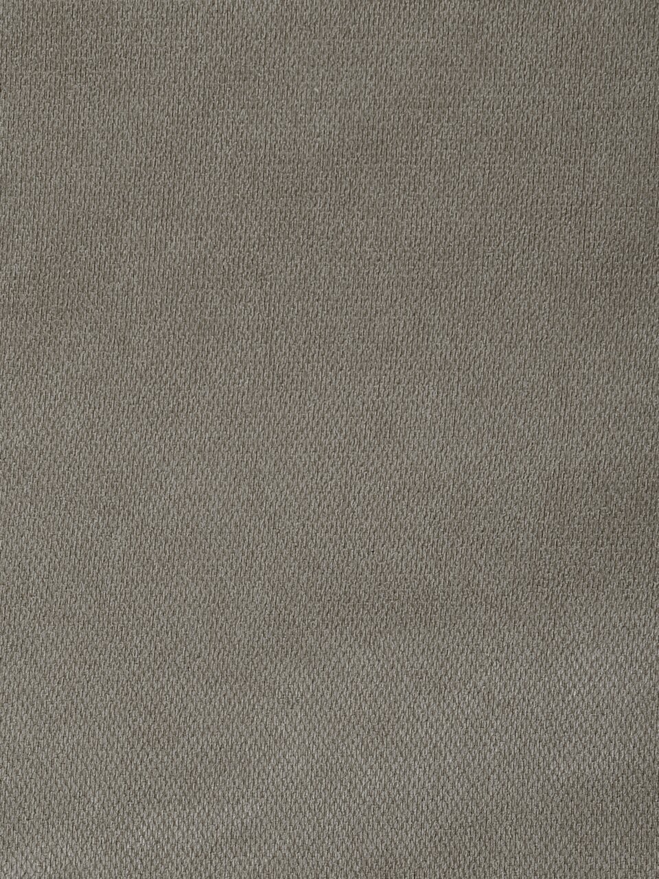 Nahaufnahme eines grauen Stoffes mit feiner Webstruktur, Draufsicht