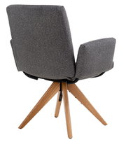 Rückansicht eines grauen Armlehnstuhls mit Holzbeinen, Modell COCOON von Dieter Knoll