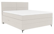 Boxspringbett in seitlicher Perspektive mit hellem Stoffbezug und schlichtem Design.