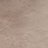 Nahaufnahme der Textur eines Schwingstuhlsitzes in beige.