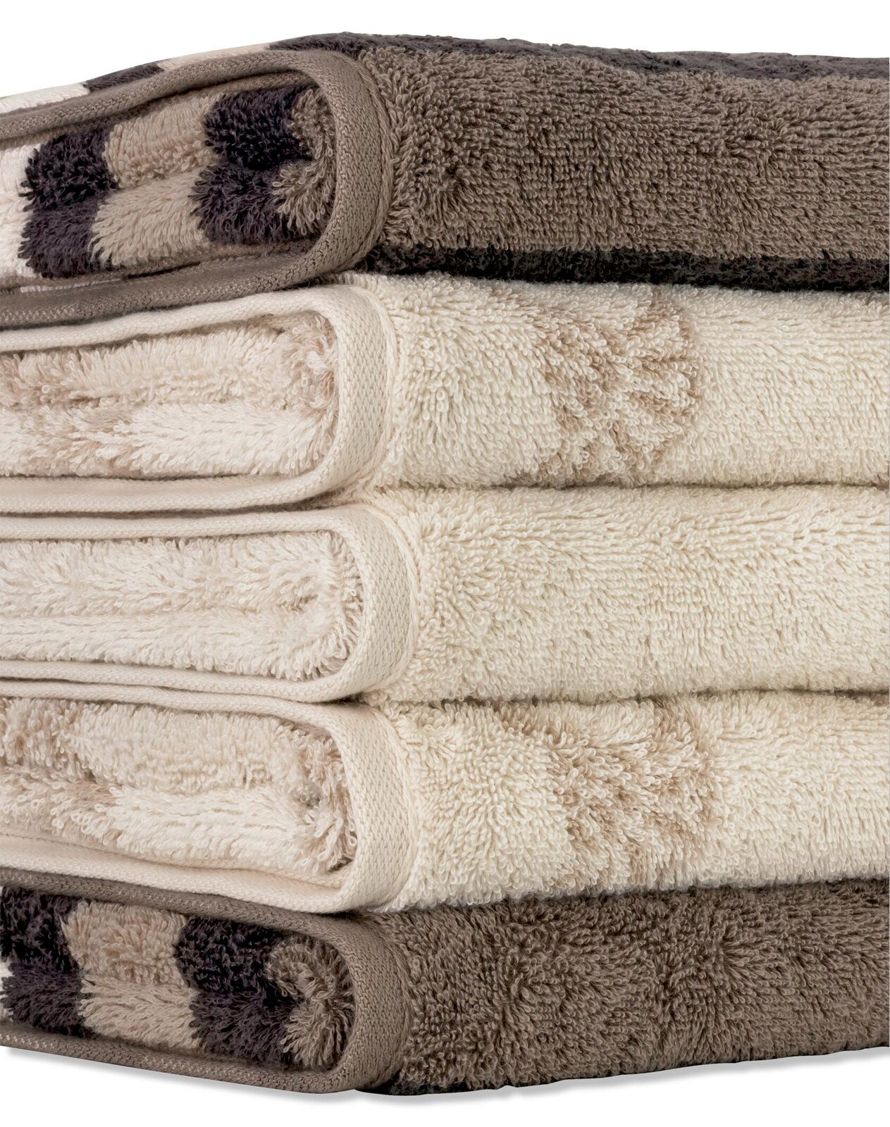 Gestapelte Gästetücher in verschiedenen neutralen Farben, seitliche Perspektive