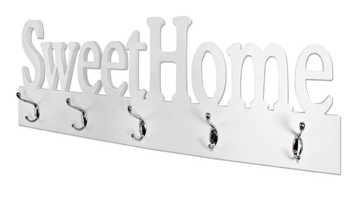 Weiße Wandgarderobe mit Schriftzug „Sweet Home“ und mehreren silbernen Haken, freigestellt vor weißem Hintergrund, in schräger Frontansicht von links