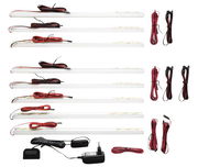 LED Rückwand Beleuchtung Set mit mehreren Leisten, Kabeln und Netzteil, von oben betrachtet.