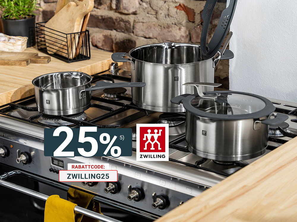 Zwilling Edelstahl Kochtopf-Set auf Gasherd in moderner Küche