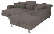 Ecksofa in Grau mit verstellbaren Kopfstützen und mehreren Kissen, Perspektive von vorne links