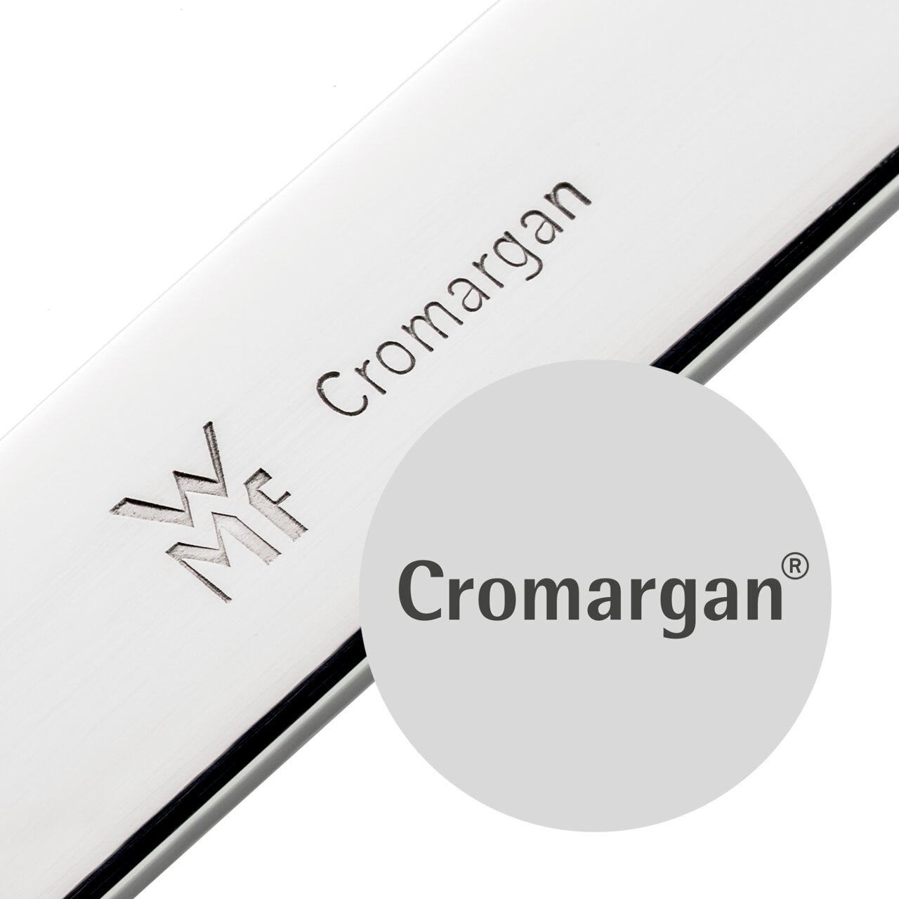 Close-up van kinderbestek van Cromargan-roestvrij staal met het WMF-logo.