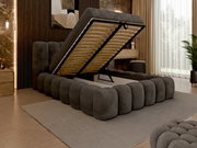 Grijs boxspringbed met opklapbaar matras, zijaanzicht, modern slaapkamerontwerp