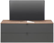 TV-Lowboard DIANA in Frontansicht mit Holzoberfläche und dunklen Schubladen, darauf steht ein Flachbildfernseher.