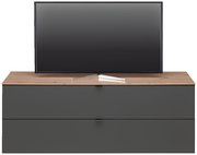 TV-Lowboard DIANA in Frontansicht mit Holzoberfläche und dunklen Schubladen, darauf steht ein Flachbildfernseher.